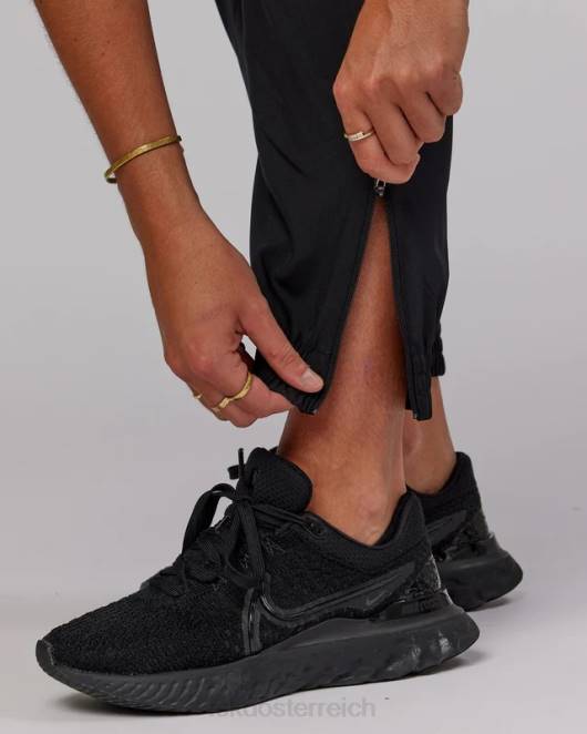 Z8RH759 LSKD Frauen Performance-Hose mit Reißverschluss und Aufwärmmanschette – Schwarz Bekleidung