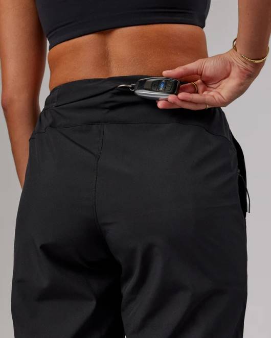 Z8RH759 LSKD Frauen Performance-Hose mit Reißverschluss und Aufwärmmanschette – Schwarz Bekleidung